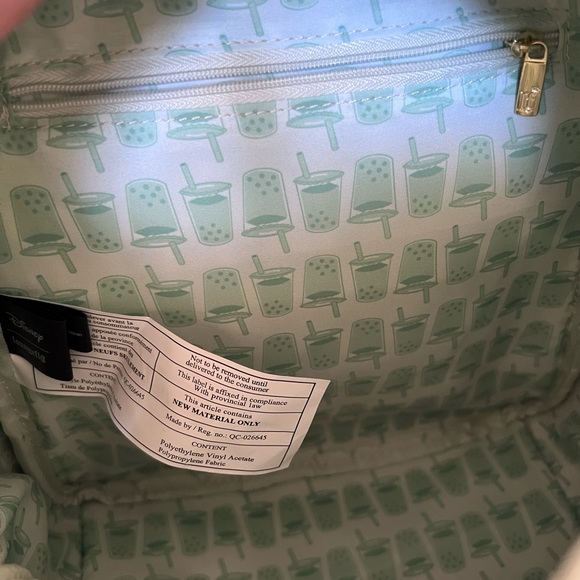 I’m selling my stitch boba back pack! Hardly used and no stains - Picture 2 of 3